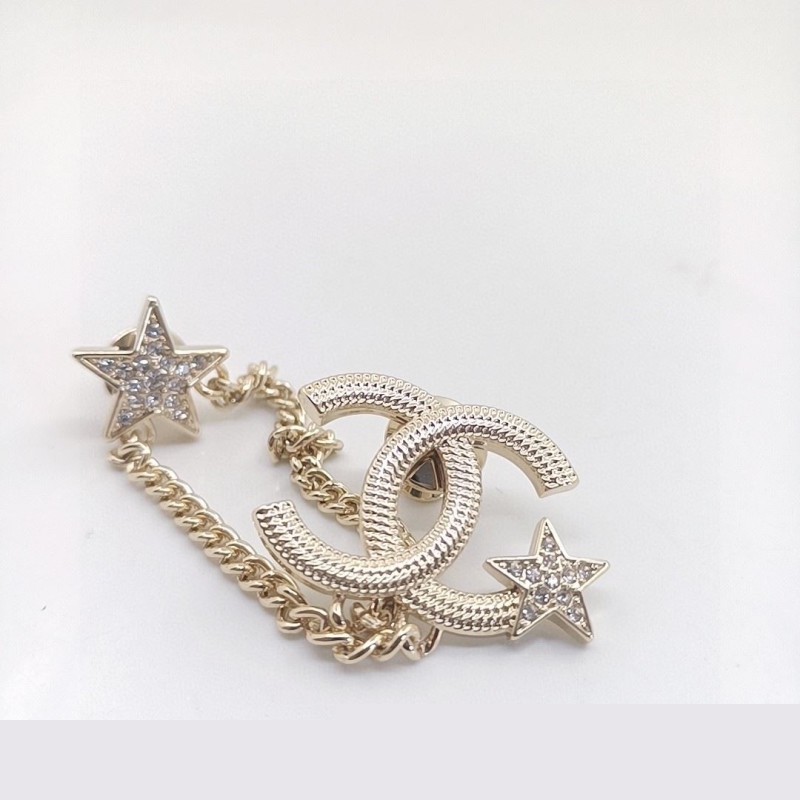 Ch*el brooches